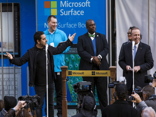 Corporate vice president for Surface Computing at Microsoft Corp. Panos Panay and the company's Chief Operating Officer Kevin Turner speak before the grand opening of a flagship Microsoft Corp. retail store in New York. Reutres File Photo.