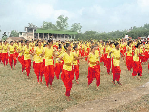 Students present cultural programmes during the Kannada Rajyotsava celebrations in Madikeri on Sunday. DH photo