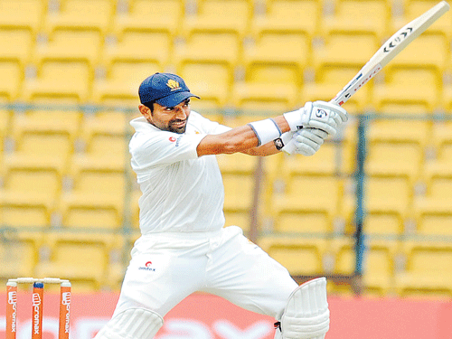 destructive: Robin Uthappa scored a superb 128-ball 160 to power Karnataka into pole  position against Rajasthan in Jaipur on Sunday. dh file photo