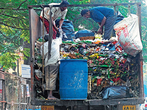 BBMP lorries carrying the City's garbage have not been allowed to enter the two units and they remained stationed outside. DH file photo