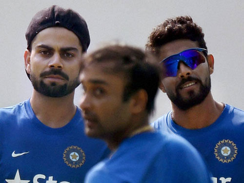 ndia's Virat Kohli, Amit Mishra and Ravindra Jadeja during a practice session ahead of the first Test match against South Africa in Mohali. PTI file photo