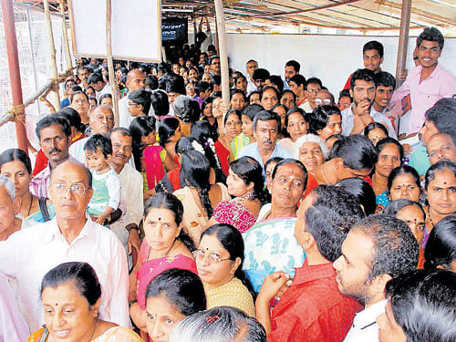 People make a beeline to Hasanamba temple in Hassan which reopened on Thursday. DH photo