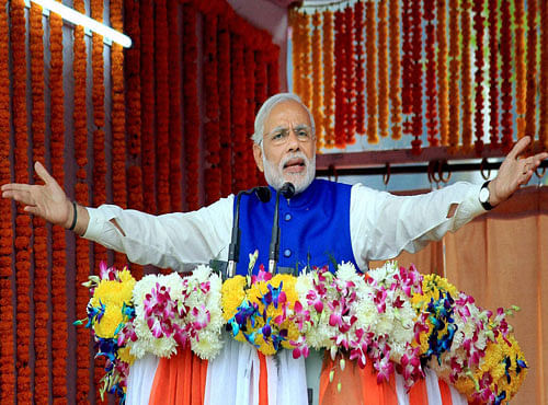 Prime Minister Narendra Modi addresses a public rally during the inauguration of 450 MW Baglihar Hydro Electric Project Stage-II, at Charankote in Ramban 150 km's from Jammu on Saturday. PTI Photo