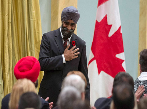 Defense Minister Harjit Singh Sajjan reacts after being sworn in during a ceremony at Rideau Hall. Reuters photo