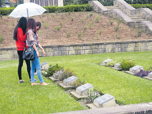 Visitors at Kohima World War II cemetery. C Sinha