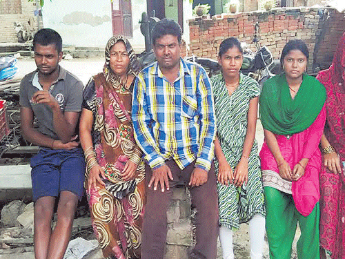 Santosh Kumar with his family members.