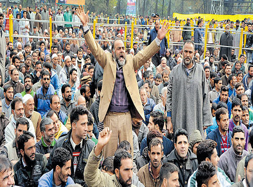 PASSION AND POLITICS: A man shouts slogans in favour of Prime Minister Narendra Modi at a public rally at Sher-i-Kashmir stadium in Srinagar on Saturday. PTI