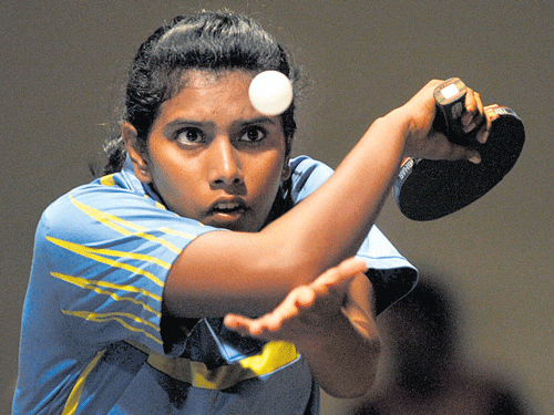 Spoorthi MV clinched girls' titles on Saturday. DH PHOTO