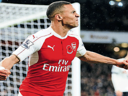fine finish Arsenal's Kieran Gibbs celebrates after scoring the equaliser against Tottenham Hotspur. reuters