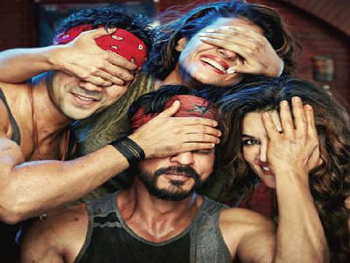 With their hands covering each other faces, the poster of the Rohit Shetty directorial shows SRK with his co-stars Kajol, Varun Dhawan and Kriti Sanon. Image courtesy: Twitter