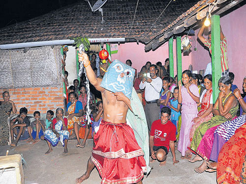 FUNNY ANTICS A villager entertaining others during the mock-wedding ceremony in Uttara Kannada district. PHOTO BY AUTHOR