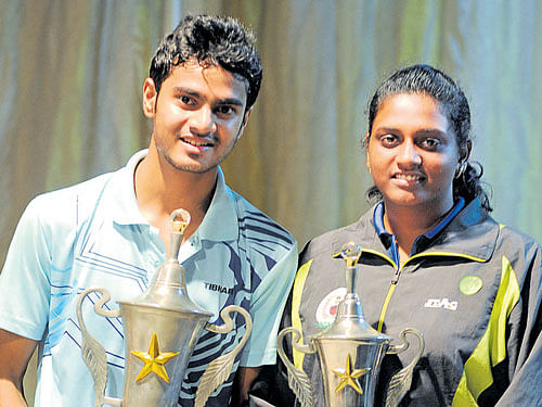 CHAMPIONS Shreyal Talang (left) and Swetha Kumarvel after winning the singles title at the CVL Sastry Memorial State Table Tennis Championship on Monday. DH PHOTO