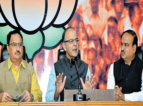 Finance Minister Arun Jaitley with Health Minister J P Nadda and BJP Bihar In-charge Ananth Kumar address a press conference after the BJP's Parliamentary Board meeting in New Delhi on Monday. PTI