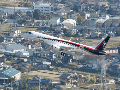An aerial view shows Mitsubishi Aircraft Corp's Mitsubishi Regional Jet (MRJ) taking off for a test flight at Nagoya Airfield in Toyoyama town, Aichi Prefecture, central Japan.  Reuters Photo.