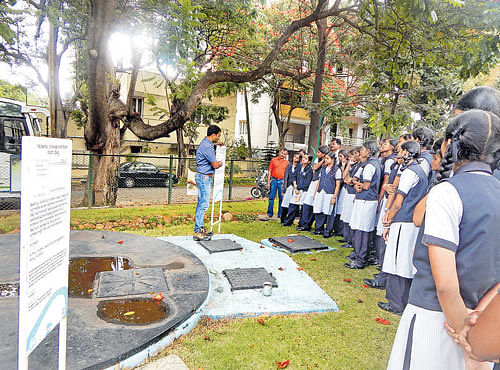 WORKING MODEL A guide explains rainwater harvesting to school children visiting the theme park. DH PHOTO