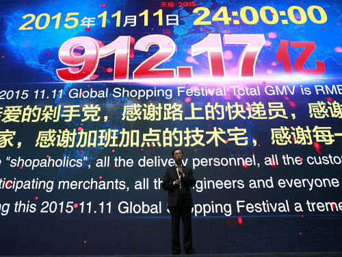 Alibaba CEO Daniel Zhang speaks at a screen showing total value of goods transacted at Alibaba Group's 11.11 Global shopping festival in Beijing, China. Alibaba Group Holding Ltd's total value of goods transacted during its Singles' Day shopping festival was 91.2 billion yuan ($14.32 billion), the Chinese e-commerce giant said. Reuters photo