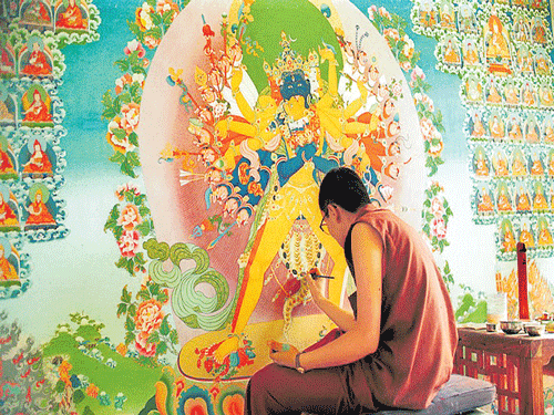intricate A Norbulingka artist works on a 'thangka', a painting process that is arduous & exacting