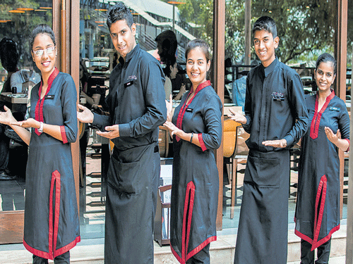 Some of the staff members of Mirchi & Mime restaurant in Mumbai.