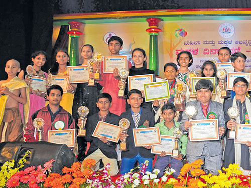 Young achievers with their trophies and certificates at the Children's Day function at Bal Bhavan on Saturday.DH&#8200;PHOTO