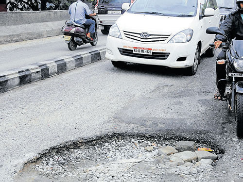 Lack of outlets for rainwater has resulted in potholes on many roads