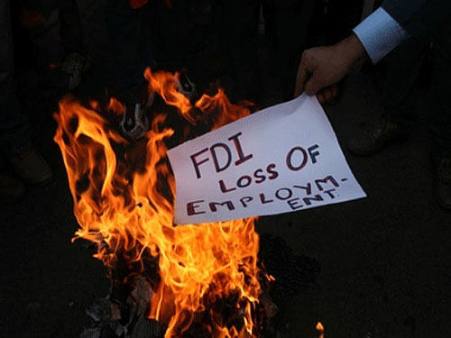 Arguing that the government has been advocating liberal FDI regime under its plans to revive manufacturing sector in the country in the name and style of Make-in-India slogan, the Manch said, 'Government's endeavour towards Make-in-India should be more of Made-by-India.' Reuters file photo