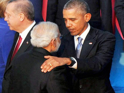 Prime Minister Narendra Modi with US President Barack Obama during the G-20 group photo at the G20 Turkey 2015, in Antalya, Turkey on Sunday. PTI Photo