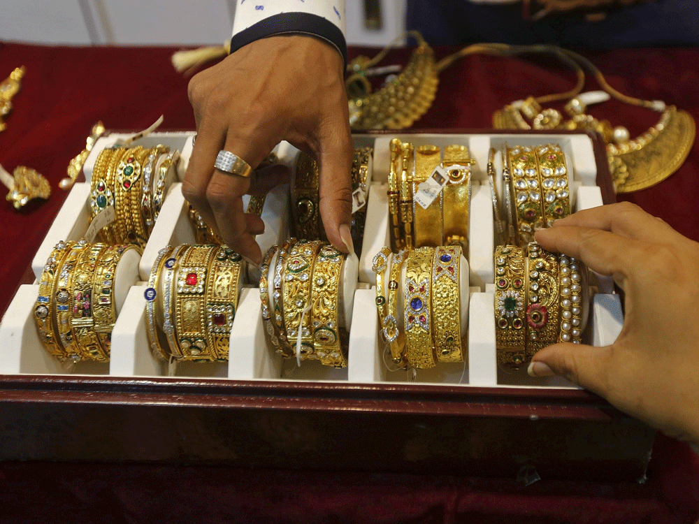 Indians have a deep attachment to gold, which they value not just as a wedding gift but also as a way to keep wealth away from the prying eyes of tax collectors. Reuters file photo
