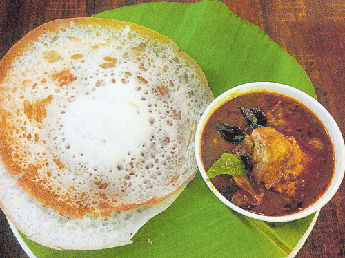 soft Appam and chicken curry.