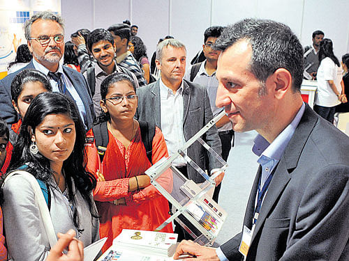 Large number of students visited the 'Meet German universities and research institutions of the higher education and research fair' on Christ University campus in Bengaluru on Saturday. German Consul General Jorn Rohde and Director of DFG German Research Foundation, Alexander P Hansen, are seen. DH PHOTO