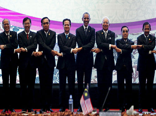 ASEAN leaders gather for a family photo with U.S. President Obama after a US-ASEAN meeting at the ASEAN Summit in Kuala Lumpur. Reuters photo