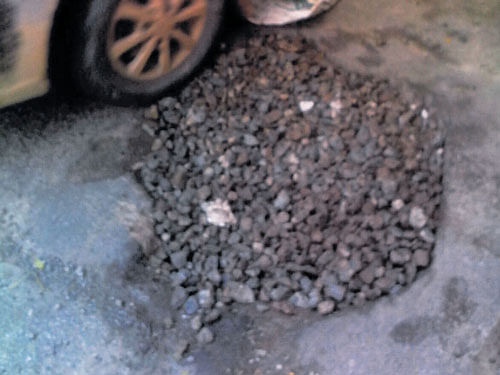 The BBMP on Sunday filled this pothole on Ramakrishna Ashram Circle. DH photo