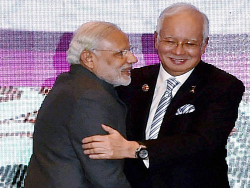 Prime Minister Narendra Modi and his Malaysian counterpart Najib Razak, pti file photo