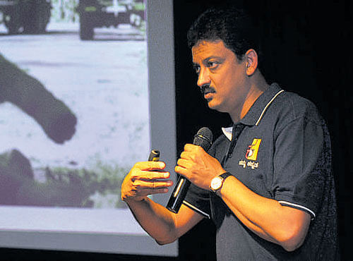Wildlife Biologist Sanjay Gubbi speaks at a panel discussion on 'Finding the Middle Path' in Bengaluru on Monday. DH PHOTO