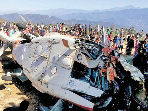 The wreckage of a chopper which crashed while carrying a disaster management team, near Meluri in Nagaland on Tuesday. PTI
