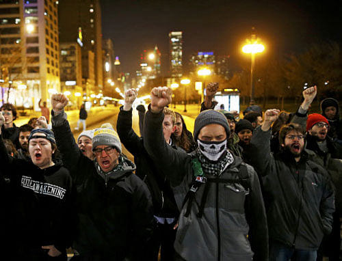 Demonstrators chant as the walk the streets during protests in Chicago. Reuters