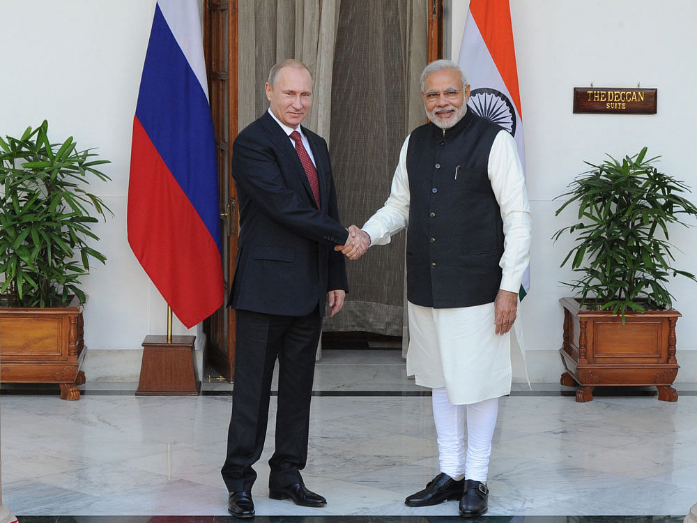 Prime Minister Narendra Modi and President Putin. Reuters file photo