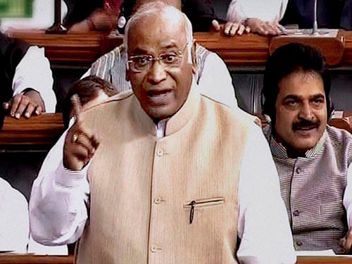 Congress Leader Mallikarjun Kharge speaks in the Lok Sabha during the first day of winter session of Parliament in New Delhi on Thursday. PTI Photo