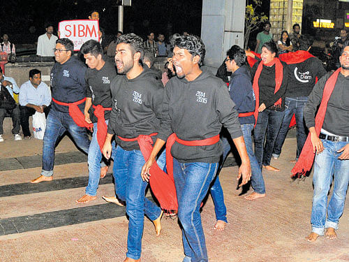 Students performa streetplay, to mark the seventh anniversary of the 26/11Mumbai terror attack, in the City on Thursday. DH PHOTO