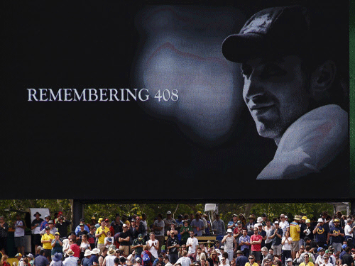 A tribute to former Australian cricketer Phillip Hughes, who was the 408th player for Australia, is displayed on a screen during the first day of the third cricket test match between Australia and New Zealand at the Adelaide Oval in South Australia, November 27, 2015. Reuters File Photo.