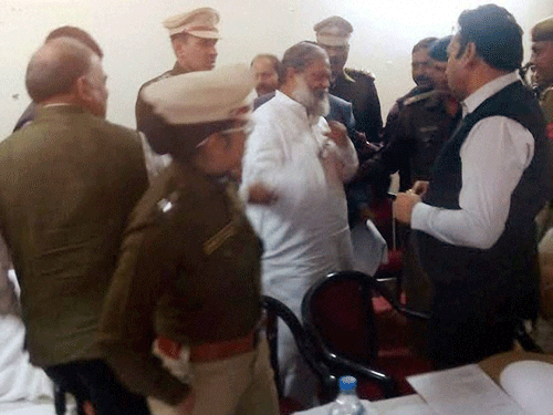 Haryana minister Anil Vij walks out after argument with SP in Fatehabad. PTI Photo