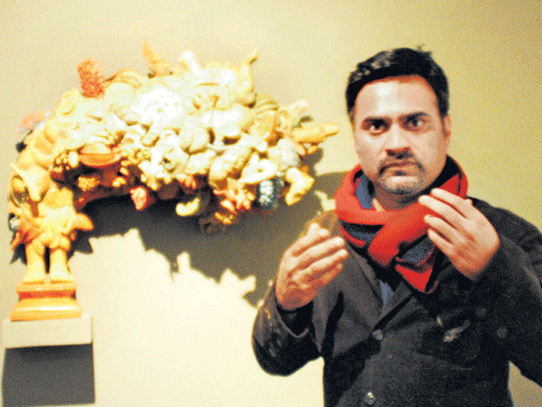 terrific terracotta Artist Manjunath Kamath with his creations at the show 'Postponed Poems'. Photos by author