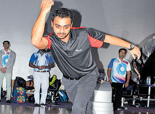 INTENSE: Tamil Nadu's Shabbir Dhankot in action during the National tenpin bowling championships on Tuesday.