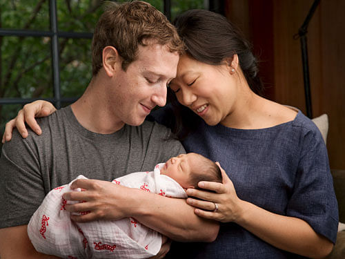 Facebook Inc. Chief Executive Mark Zuckerberg and his wife Priscilla are seen with their daughter named Max. reuters photo