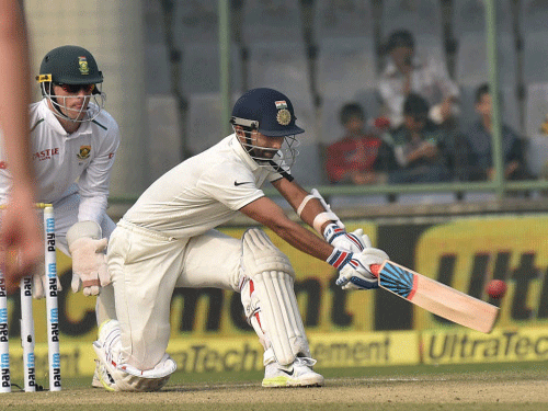 India's Ajinkya Rahane plays a shot against South Africa during 1st day of the fourth Test match at Ferozshah Kotla Stadium in New Delhi on Thursday. PTI Photo.