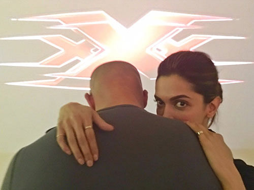 In the photo, posted in her social media pages, the 29-year-old actress is seen hugging Diesel in the backdrop of the logo of the movie franchise 'XXX'. Image courtesy: Twitter