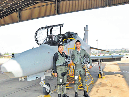 proud moment: Air Marshal Kulwant Singh Gill with his son Flying Officer Shahbeg Gill, after flying a three-aircraft close  formation sortie on a Hawk Mk132 at the Bidar Air Force station on Saturday. DH PHOTO