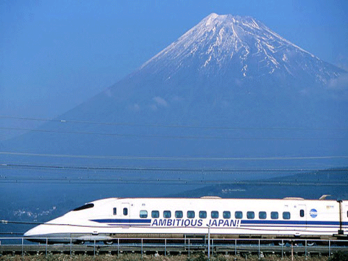 Japan's bullet train speeding past Mount Fuji in Fuji city, west of Tokyo. Reuters File Photo.