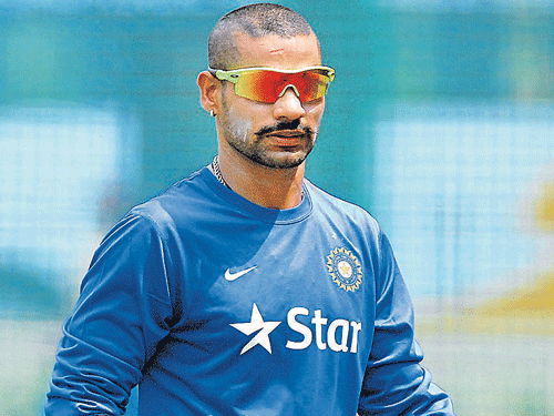 The ICC yesterday issued a media release, saying that Dhawan's part-time off-breaks were found illegal by the on-field umpires and his action was reported. DH file photo