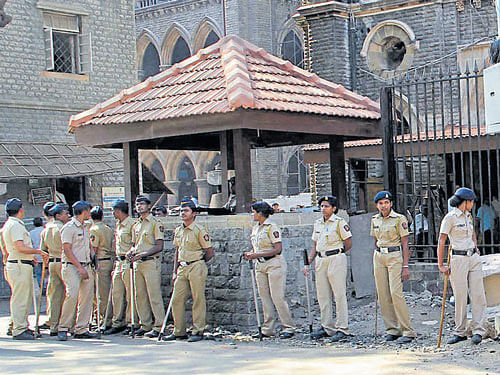Tight police security outside the Bombay HC building in Mumbai . PTI