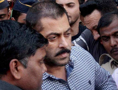 Actor Salman Khan leaves Bombay High Court after he was acquitted in 2002 Hit and Run case, in Mumbai on Thursday. PTI Photo
